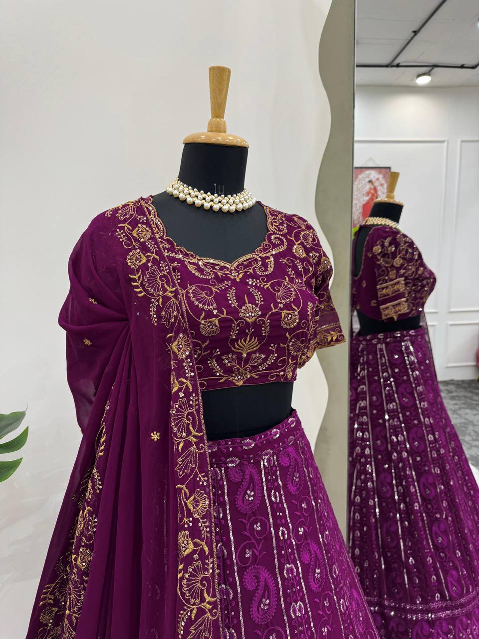 Side view of Brinjal Embroidered Lehenga Choli showcasing intricate design and flowing silhouette